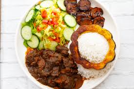 White Rice and stew, salad, plantain, and Beef